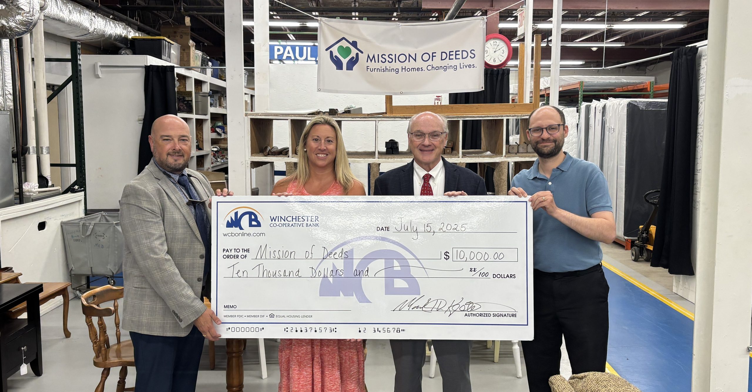 Mark and Chris with big donation check