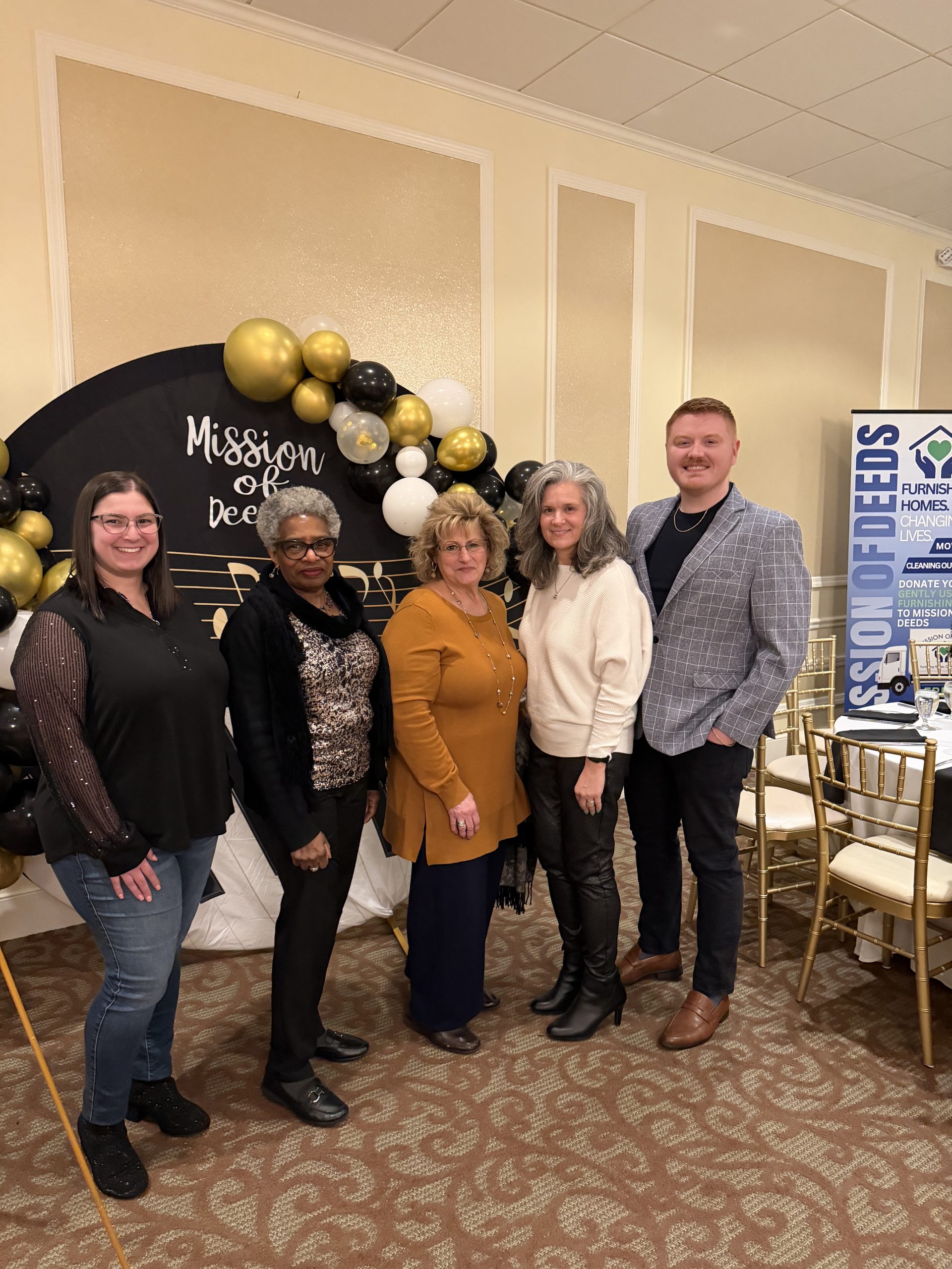 group in front of balloons at events