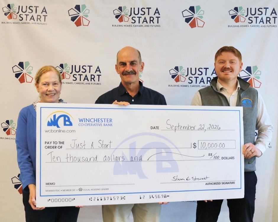 Julie and Jay with carl from JAS with big check