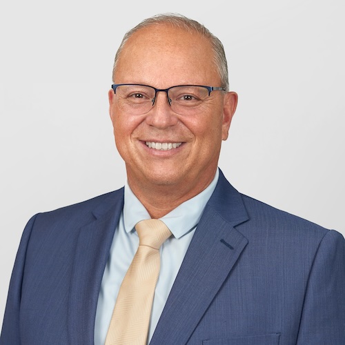 Headshot of John Tirusa