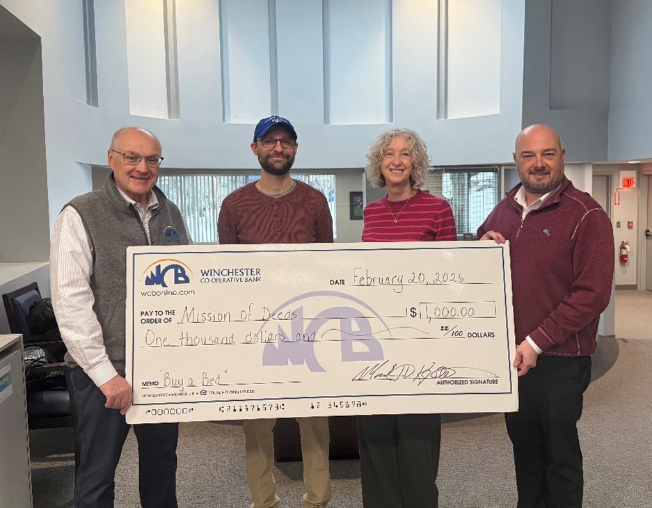 Mark and Chris with MOD holding donation check