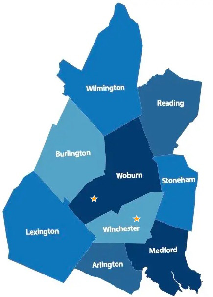Illustrated map showing the Bank's CRA towns in shades of blue. The Bank's offices in Woburn and Winchester are indicated on the map by yellow stars.