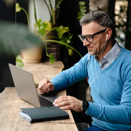 Business man looking at computer screen.